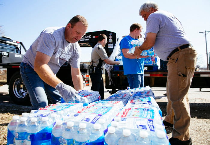 The Disaster Services team unloads water for residents of the mobile home park.